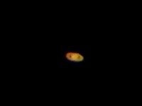 One of the coolest things I've seen, ever. The first picture is Jupiter and 4 moons, and the second, its Saturn! I'm glad my phone could pick it up through the telescope. I mean, just look at it! Its amazing! Thanks to our neighbors for allowing us to view